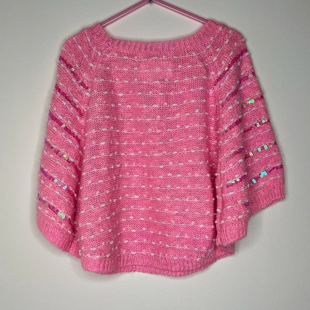 Justice pink sweater poncho with a sleeve iridescent sequins on front size 6/7